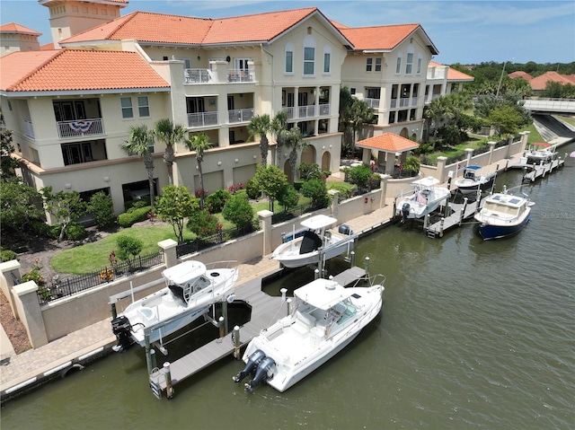 200 Bella Harbor Ct Unit 113, Palm Coast, FL 32137 - dock with a water view and boat lift