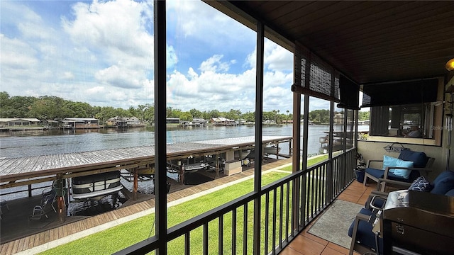 1640 Juno Trl Unit 202E, Astor, FL 32102 - sunroom featuring a water view