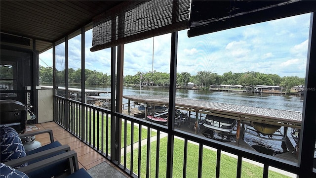 1640 Juno Trl Unit 202E, Astor, FL 32102 - balcony with a water view and view of wooded area