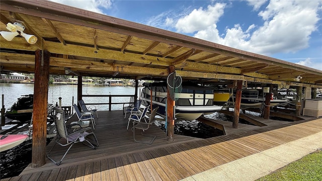 1640 Juno Trl Unit 202E, Astor, FL 32102 - dock featuring boat lift and a water view