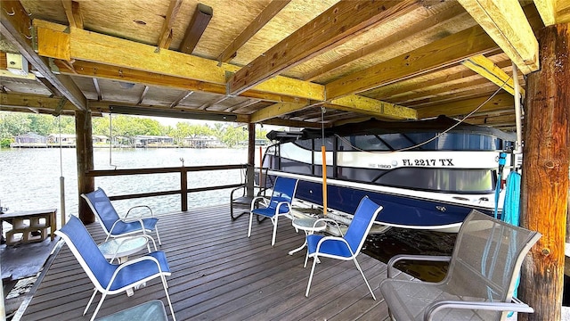 1640 Juno Trl Unit 202E, Astor, FL 32102 - dock with boat lift and a water view