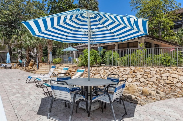 640 N Nova Rd Unit 117, Ormond Beach, FL 32174 - view of patio with outdoor dining space