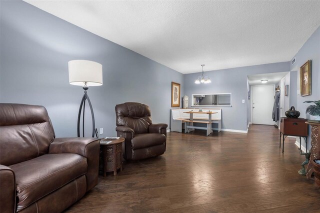 640 N Nova Rd Unit 117, Ormond Beach, FL 32174 - living room with a chandelier, wood-type flooring, and a textured ceiling