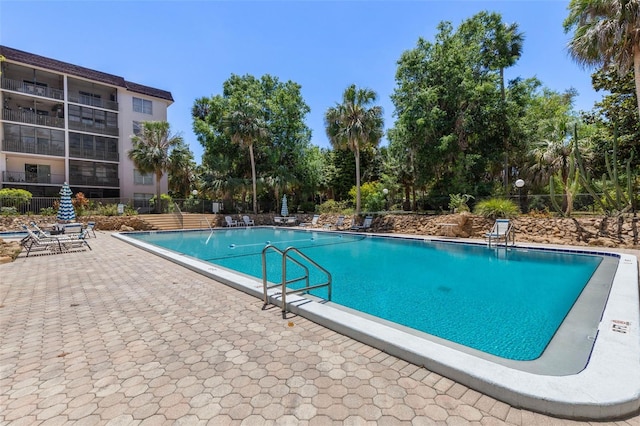 640 N Nova Rd Unit 117, Ormond Beach, FL 32174 - community pool with a patio area