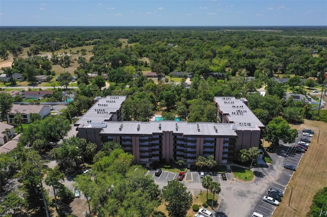 640 N Nova Rd Unit 117, Ormond Beach, FL 32174 - drone / aerial view of a heavily wooded area