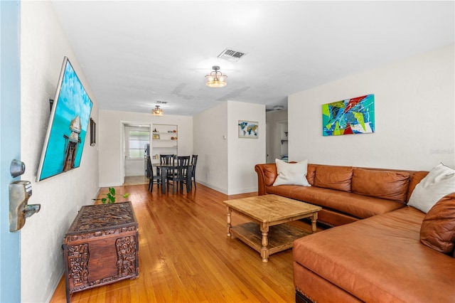 129 Dundee Rd, Daytona Beach, FL 32118 - living room with light wood-type flooring and baseboards
