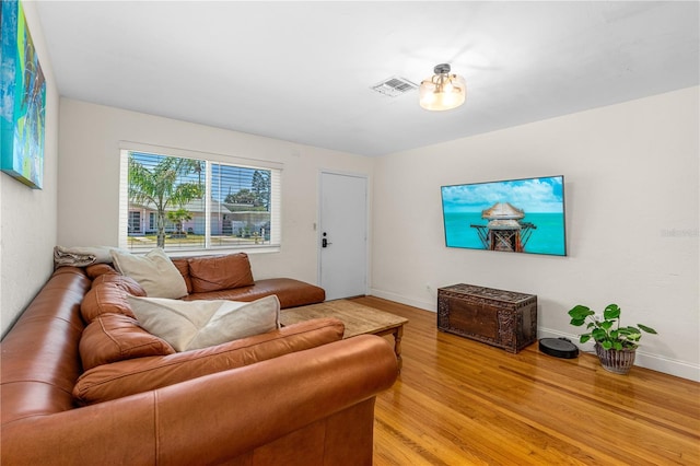 129 Dundee Rd, Daytona Beach, FL 32118 - living area featuring light wood-style floors and baseboards