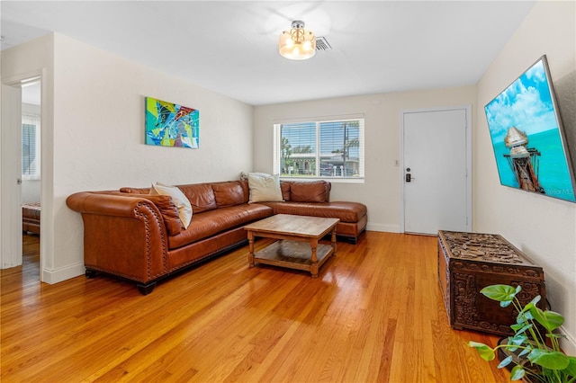129 Dundee Rd, Daytona Beach, FL 32118 - living room featuring light wood-style floors and baseboards