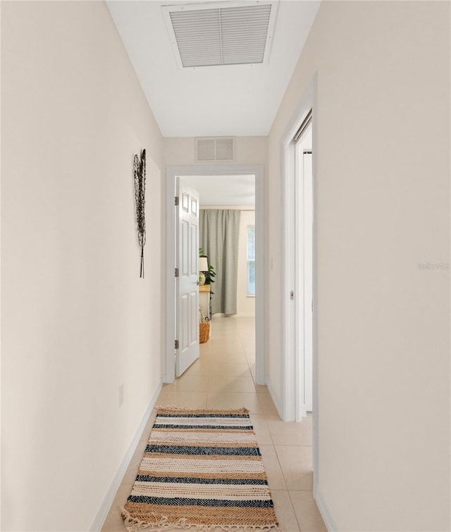 217 Birchwood Dr, Palm Coast, FL 32137 - corridor with baseboards and light tile patterned flooring