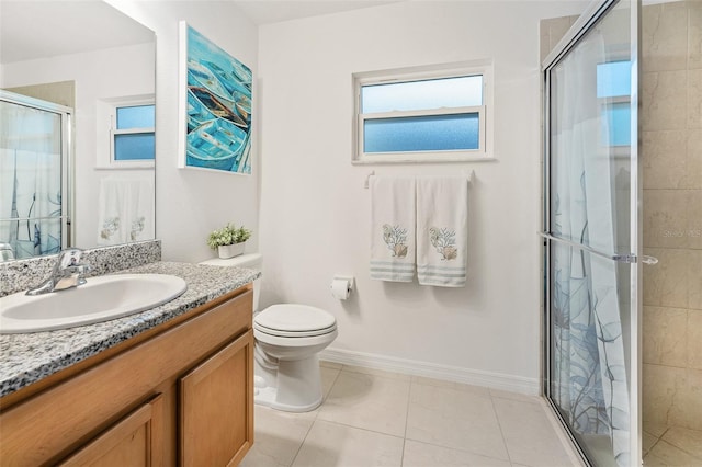 217 Birchwood Dr, Palm Coast, FL 32137 - full bath with vanity, a shower stall, toilet, tile patterned flooring, and baseboards