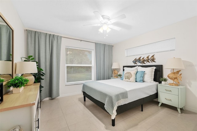 217 Birchwood Dr, Palm Coast, FL 32137 - bedroom with baseboards, ceiling fan, and light tile patterned flooring