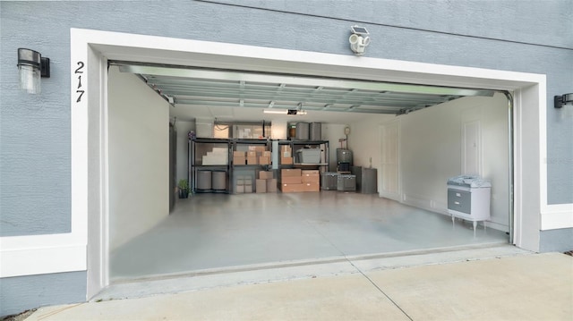 217 Birchwood Dr, Palm Coast, FL 32137 - garage with a garage door opener