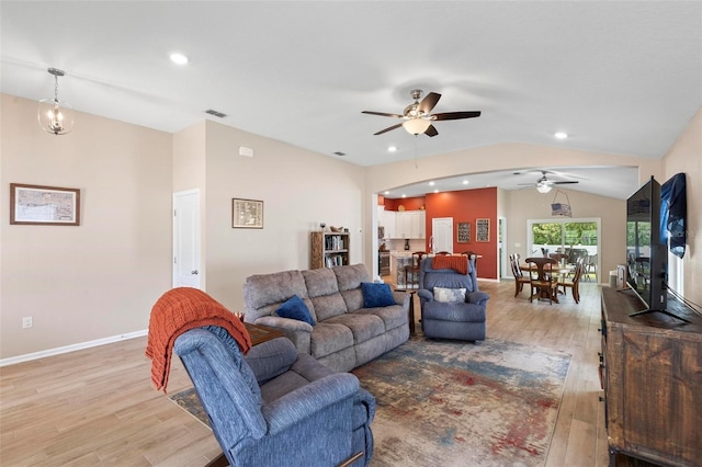 65 Lob Wedge Ln, Bunnell, FL 32110 - living room with a ceiling fan, light wood-type flooring, vaulted ceiling, recessed lighting, and baseboards