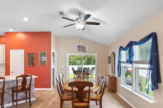 65 Lob Wedge Ln, Bunnell, FL 32110 - dining space with light wood finished floors, ceiling fan, lofted ceiling, baseboards, and recessed lighting