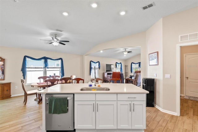 65 Lob Wedge Ln, Bunnell, FL 32110 - kitchen with ceiling fan, dishwasher, open floor plan, a sink, and lofted ceiling