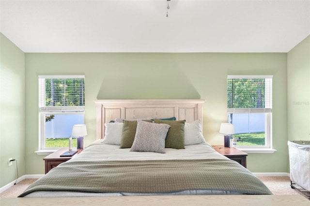 65 Lob Wedge Ln, Bunnell, FL 32110 - carpeted bedroom with baseboards