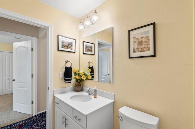 65 Lob Wedge Ln, Bunnell, FL 32110 - half bath featuring vanity and toilet