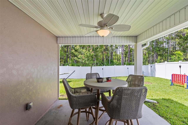 65 Lob Wedge Ln, Bunnell, FL 32110 - view of patio with ceiling fan and outdoor dining area