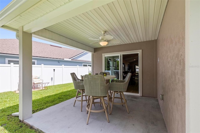 65 Lob Wedge Ln, Bunnell, FL 32110 - view of patio featuring a ceiling fan and outdoor dining area