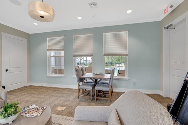65 Lob Wedge Ln, Bunnell, FL 32110 - dining area with baseboards, crown molding, and recessed lighting