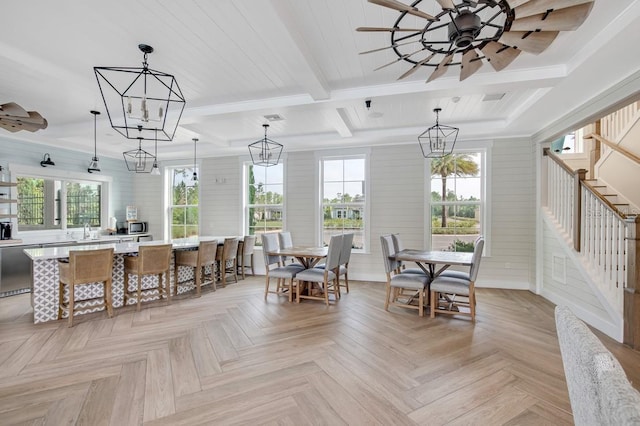 65 Lob Wedge Ln, Bunnell, FL 32110 - dining room with stairway, beam ceiling, wood walls, a chandelier, and a ceiling fan