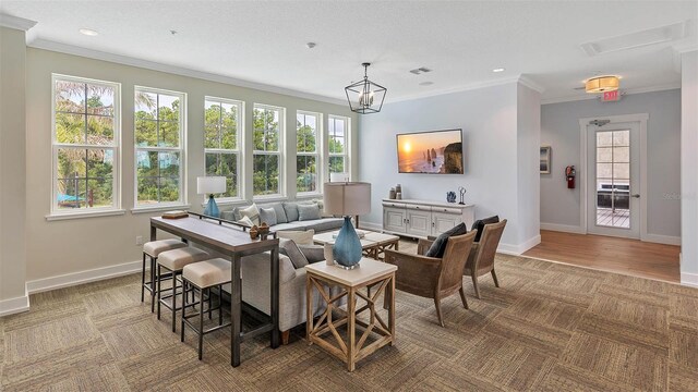 818 Grand Reserve Dr, Bunnell, FL 32110 - living room featuring ornamental molding, baseboards, and recessed lighting