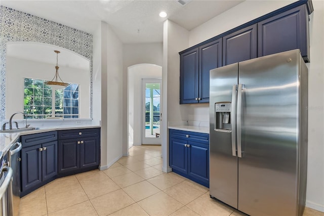 775 Blackmoor Gate Ln, Saint Augustine, FL 32084 - kitchen with stainless steel appliances, a sink, arched walkways, healthy amount of natural light, and recessed lighting