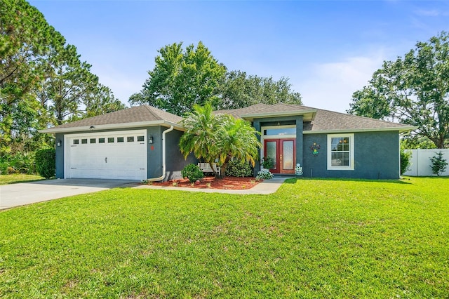 8 Buttermill Dr, Palm Coast, FL 32137 - view of front facade with french doors, stucco siding, driveway, and an attached garage
