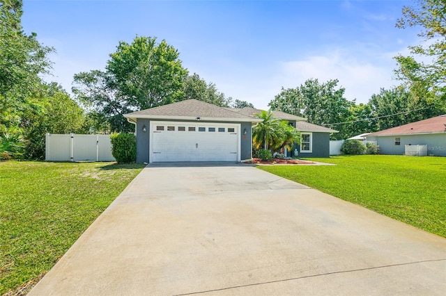 8 Buttermill Dr, Palm Coast, FL 32137 - ranch-style home featuring concrete driveway, a garage, stucco siding, and a gate