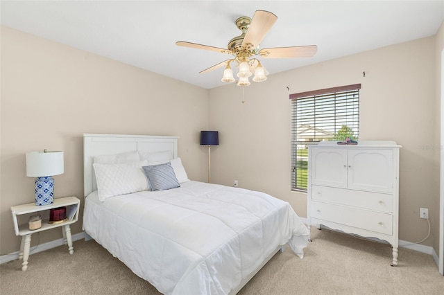 8 Buttermill Dr, Palm Coast, FL 32137 - carpeted bedroom with baseboards and a ceiling fan