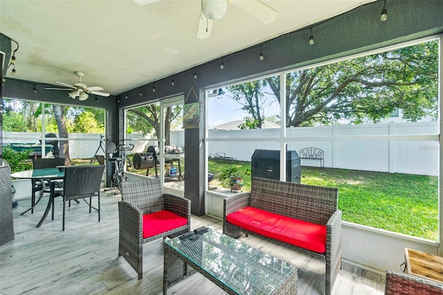 8 Buttermill Dr, Palm Coast, FL 32137 - sunroom / solarium with ceiling fan, outdoor dining space, and an outdoor living space