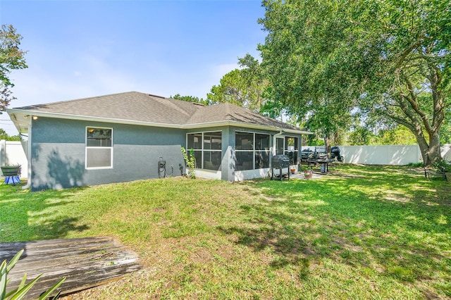 8 Buttermill Dr, Palm Coast, FL 32137 - back of property with a sunroom and stucco siding