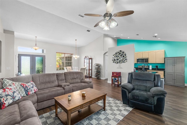 8 Buttermill Dr, Palm Coast, FL 32137 - living area with wood finished floors, high vaulted ceiling, a ceiling fan, baseboards, and french doors