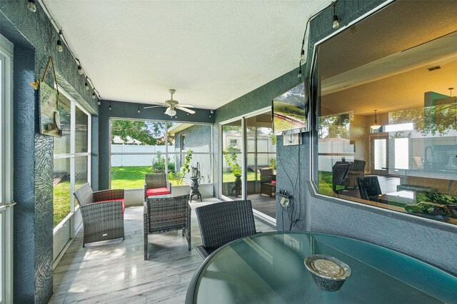 8 Buttermill Dr, Palm Coast, FL 32137 - wooden deck with a ceiling fan and outdoor lounge area