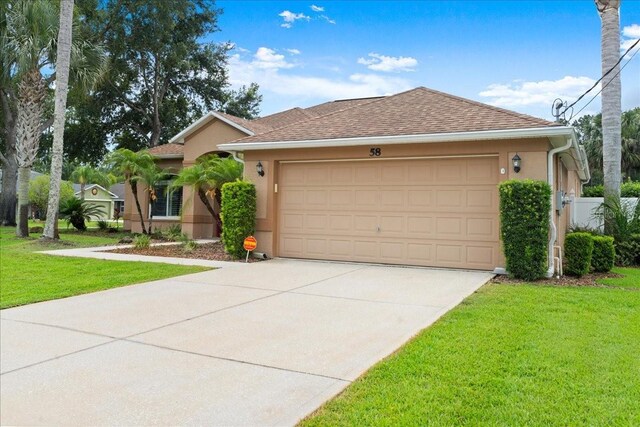 58 Slocum Path, Palm Coast, FL 32164 - ranch-style home featuring stucco siding, an attached garage, concrete driveway, a front lawn, and roof with shingles