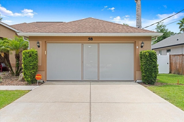 58 Slocum Path, Palm Coast, FL 32164 - garage featuring concrete driveway