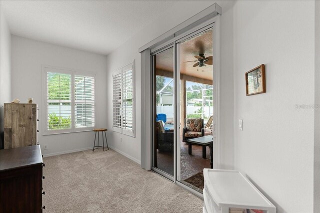 58 Slocum Path, Palm Coast, FL 32164 - interior space with plenty of natural light, light colored carpet, baseboards, and ceiling fan