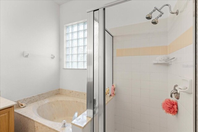 58 Slocum Path, Palm Coast, FL 32164 - full bath with a garden tub, a shower stall, and vanity