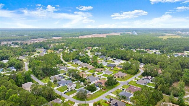 58 Slocum Path, Palm Coast, FL 32164 - aerial overview of property's location with nearby suburban area