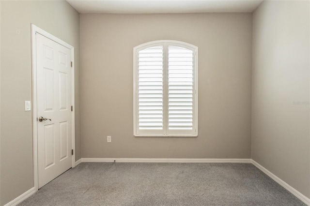 45 Atlantic Dr, Palm Coast, FL 32137 - unfurnished room featuring carpet and baseboards