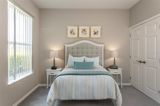 45 Atlantic Dr, Palm Coast, FL 32137 - bedroom featuring carpet floors, a closet, and baseboards