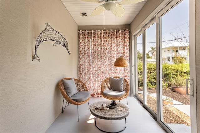 45 Atlantic Dr, Palm Coast, FL 32137 - sunroom with a ceiling fan