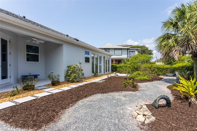 45 Atlantic Dr, Palm Coast, FL 32137 - view of yard featuring a ceiling fan