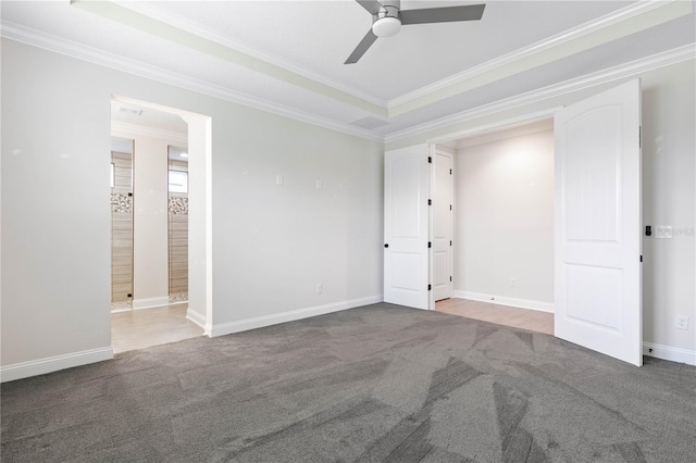 13 Las Brisas Way, Palm Coast, FL 32137 - unfurnished bedroom featuring carpet floors, crown molding, ensuite bathroom, baseboards, and ceiling fan