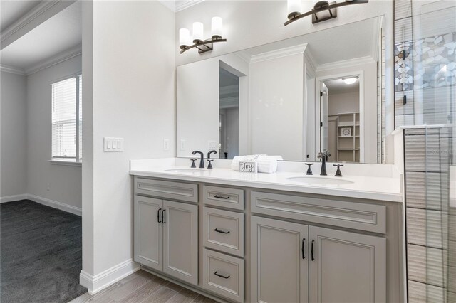 13 Las Brisas Way, Palm Coast, FL 32137 - bathroom featuring ornamental molding, double vanity, baseboards, and a shower