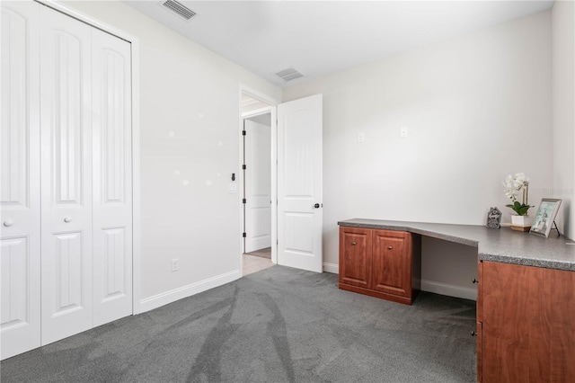 13 Las Brisas Way, Palm Coast, FL 32137 - unfurnished bedroom with carpet floors, baseboards, and a closet