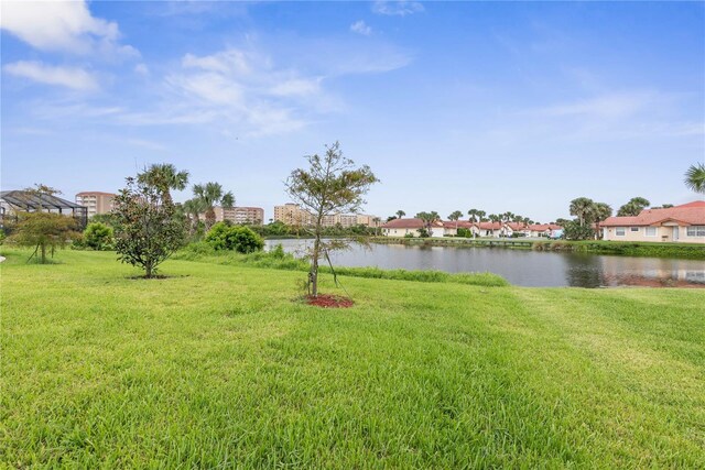 13 Las Brisas Way, Palm Coast, FL 32137 - view of grassy yard with a water view and a residential view