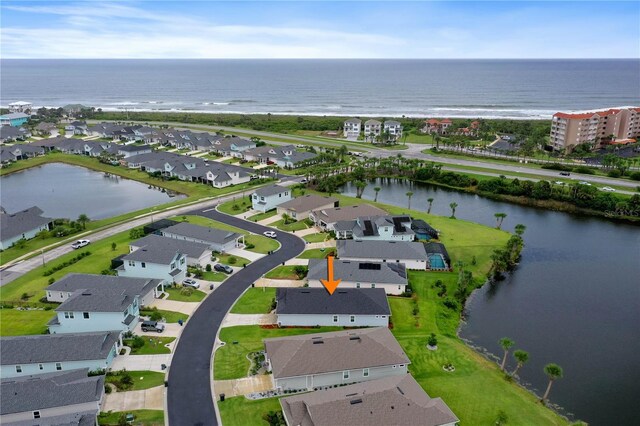 13 Las Brisas Way, Palm Coast, FL 32137 - aerial perspective of suburban area featuring a nearby body of water