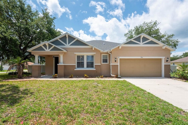 1 Rockwell Ln W, Palm Coast, FL 32164 - craftsman-style house with stucco siding, driveway, an attached garage, and a front yard