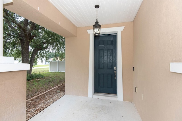 1 Rockwell Ln W, Palm Coast, FL 32164 - property entrance with stucco siding